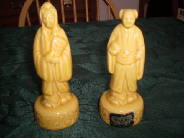 Haeger R-628 and R-629 Chinese man and lady [yellow glaze]